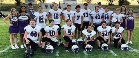 L-R: Monte Hughbanks, Ayleen Aviles, Coach Aviles, #21 Cutler Gray, #12 Levi Hughbanks, #3 Joseph Usery, #7 Andrew Woerndell, #13 Edgar Flores, #40 William Oldham, Coach James, #14 Angel Cervantes, #1 Conner Greenwood, Brinlyn Mann, Reese Eckert, #86 Ryver Phelan, #20 Kayden Pierce, #5 Ryan Waddle, #2 Kevin Cervantes, #34 Anthony Palacio, and #33 George Gross Courtesy of Richland Springs Coyote Booster Club