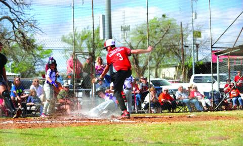 #9 Rextyn Hunt sliding into home last weekend