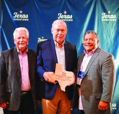 Accepting the award are: Rick Baskin and Ray Hawkins, representing the Foundation; with Jorge Quirino, Lubbock Economic DevelopmentAlliance and TXDT Board of Directors President. Courtesy of Texas Downtown
