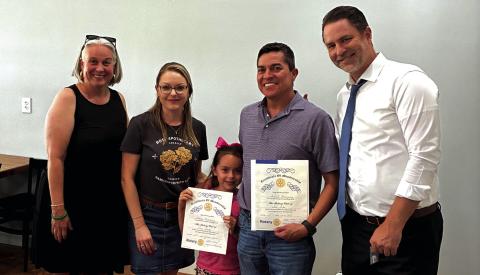 Rotarians Marcus and Paula Wood welcome new members Sammy, Amber, and Layla Roderiguez.