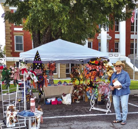 Fern Putnam, long-time San Saba resident, had one of the many booths set up last Saturday at Pecan Capital Trade Day. Among her home-made Christmas ornaments were gingerbread men, angels, cows, and Santa Claus ornaments with the beard made out of buttons!