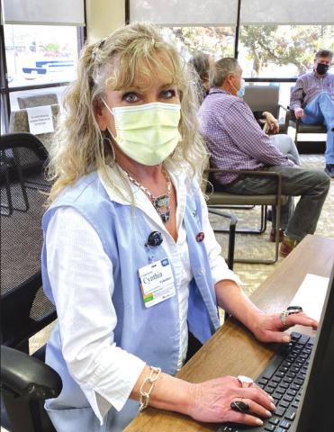 Cynthia Lively welcomes patients and visitors arriving at Hill Country Memorial. She is one of dozens of active volunteers supporting the staff as greeters, clerical help, and runners.