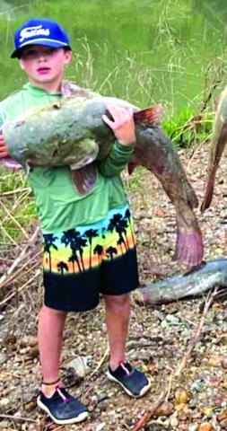 Nine-year-old Caleb Snider caught a 28-pound yellow cat on a fishing trip he just took with his dad (Seth Snider), brother and cousins. They went fishing on a four-day trip on the Colorado River in San Saba County. Caleb caught this yellow cat on his fishing pole! Courtesy of Megan Snider (proud mom)