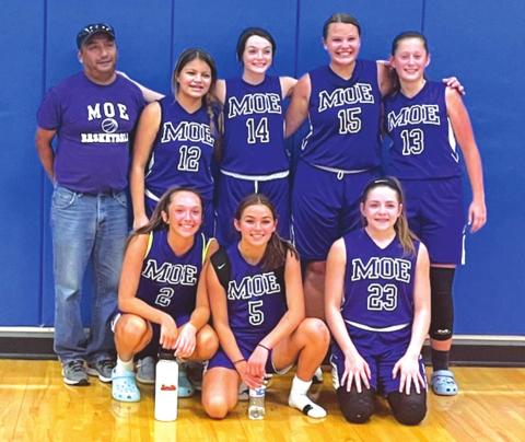 MOE Basketball team members are (left to right): Bottom row – Cinzlea Stanton, Ema Argote, and Amber Bridges. Back row – Coach Oscar Zepeda, Aaliyah Patino, Addison Massingill, Henlee Wagner, and Kate Lengefeld.