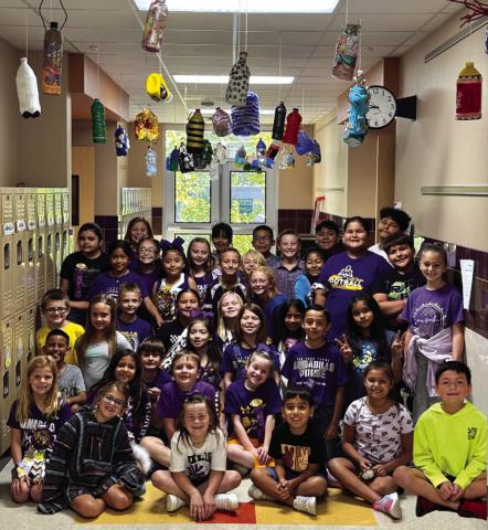 SSES 3rd graders display their bottle trees