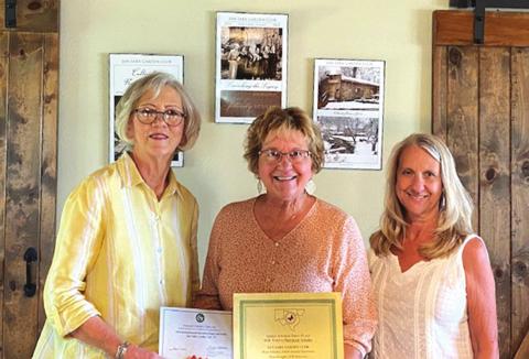 Shown are past Co-Presidents, Rhonda Killion (left) and Mona McMahan (right), along with current President, Debbie Shahan (middle).