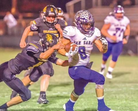 October 12, 2018 – San Saba Armadillos vs Goldthwaite Eagles – 101st meeting; 78-0 victory; #8 Eli Salinas runs through a tackle on a long touchdown run. (Photo by Buddy Whitley)