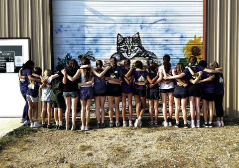 Girl Scout Troop 50 lends a Helping Hand at local animal shelter