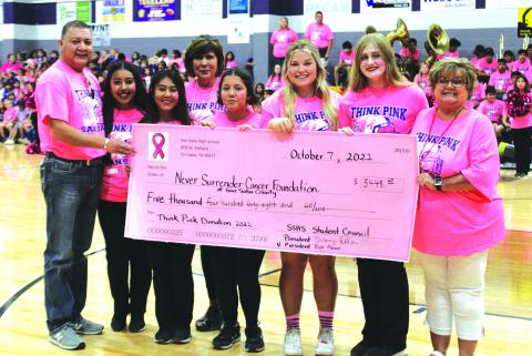 Pictured are (left to right): Silvestre Barco, Never Surrender Member; Kristi Macias, SSHS Student Council Vice President; Natalie Cuevas, SSHS Student Council Treasurer; Dora Miller, Never Surrender Member; Leia Kilman, SSHS Student Council Secretary; Caroline McHam, SSHS Student Council Reporter; Delaney Ellis, SSHS Student Council President; and Never Surrender Board President Donna Shahan. Photo by Deanne Cromer