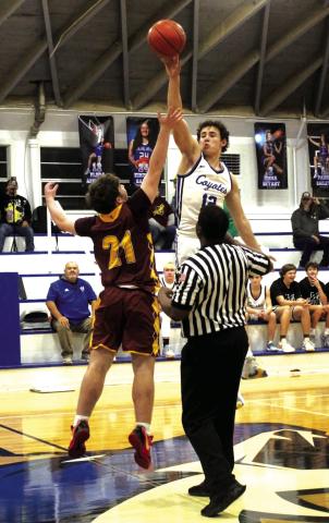 Eli Hutchins #12 jumping high above the opposition in last Friday’s win against Lometa, 73-20.