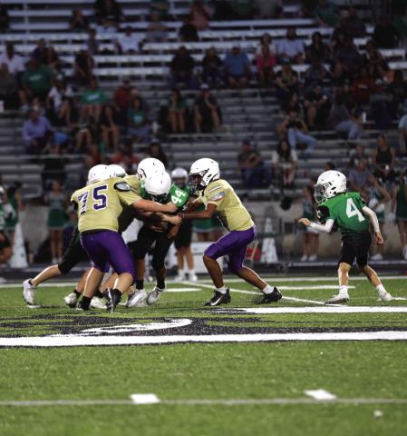 Dillo defense #75 Silver Walts and #11 Rome Hatten stop Burnet runner last Thursday, September 18th.