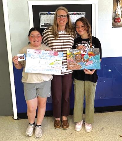Two Cherokee Elementary students from Mrs. Padgett's class tied for third place: Milly Lemaster, 4th grader (left), and Victoria Ramos, 5th grader (right).