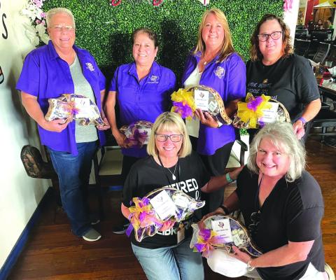 Left to right: Front – Deanne Cromer and Madelynn Richardson; Back – Diane Wood, Martha Flores, Machelle Perry and Bari McGilvray. Courtesy of Machelle Perry