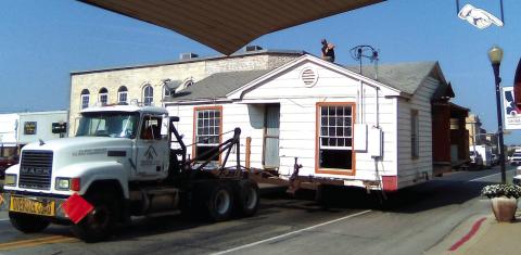 Buildling that formerly housed Taco's Mi Casa makes its way down Wallace Street. Photo by Carolyn Preece