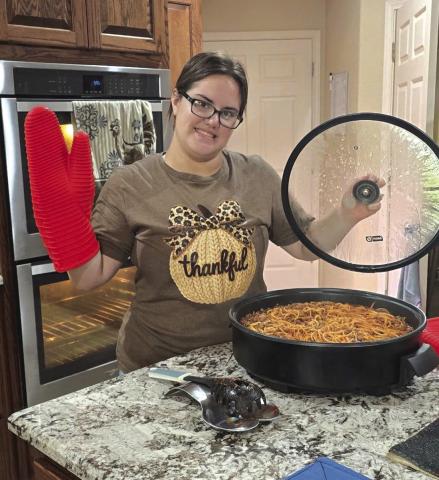 Susan making dinner
