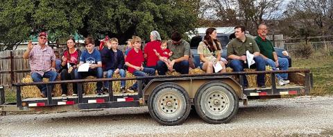 Members of San Saba’s First Baptist Church jumped on this trailer last Sunday afternoon and went caroling to bring the Good News of Jesus’ birth to some members of the community. Photo by Djuana Payton