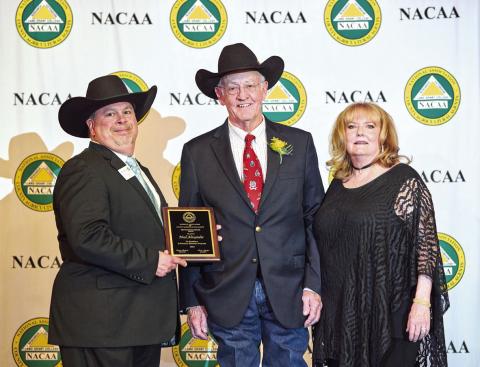 Neal Alexander receiving the Distinguished Service Award from NACAA President Keith Mickler. Also pictured with Neal is his wife, Marjean. Courtesy of NACAA Recognition and Awards Committee