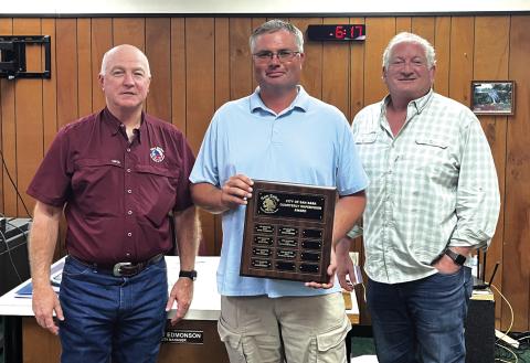 Supervisor of the Third Quarter award was given to Golf Supervisor Michael Whitley (center). City Manager Scott Edmonson (left) and Alderman Shawn Oliver (right) took part in the presentation. Michael was presented with a plaque with his name on it and and was given a gift certificate to a local restaurant. Photo courtesy of Scott Glaze
