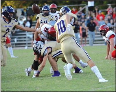 Fumble!! Sterling Proffitt (2) and Lane Miller (10) hustle for the fumble caused by Levi Glover Courtesy of Rita Boultinghouse