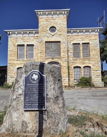 The Historical Marker in front of the Jail reads:  San Saba County Jail ~ County's oldest existing public building. Erected in 1884, the structure cost $13,000 and the lot $500. Jail was built of Blue Limestone in Italianate-Texas style. A 12-foot high board fence (built after an 1886 jailbreak) has been replaced. Jailer lives on first floor. Recorded Texas Historic Landmark-1969. 