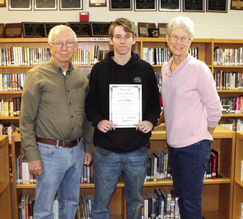Rotarians Jerry Blankenship and Beth Griess with Chris Sealy Photo by Deanne Cromer