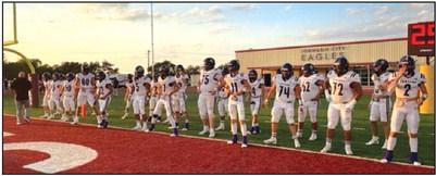 Dillos warming up before the game. They are lined up and ready to go!  Photo by Jake Lackey
