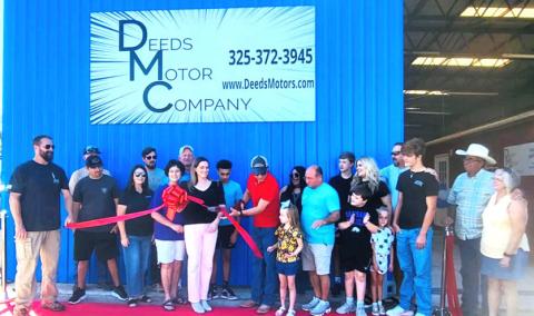 Ribbon Cutting Ceremony for Deeds Motor Company new location. Small photo: Ramon Aguilar was happy to receive the $1,000 cash drawing winnings from Billy Deeds!