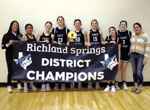 Congratulations to the Junior High Lady Coyotes who are Undefeated District Champions as well as 5X District Champions! Pictured JH Lady Coyotes (L-R): Coach Chandler, Arleen Aviles, Brinlyn Mann, Macy Mask, Brylee Chandler, Kaylee Salas, Grace Younggreen, Makayla Kubin and Coach Martin. Courtesy of Richland Springs Coyote Booster Club