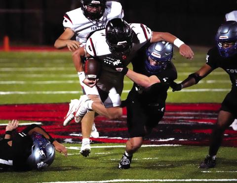 # 5 Brice Roesler, #14 Ian McKinnerney (on the side by #5) and on the ground #11 Matthew Woerndell  Photo by Pam Starr