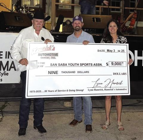 Lynn Hamrick presented the $9,000 check (from the sales of the tables at the event) to Aaron Johnson (SSYSA President) and Margaret Henslee (SSYSA Vice President) representing the San Saba Youth Sports Association (SSYSA). Courtesy of Hamrick’s Automotive Center