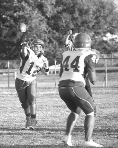 Tatum Shanklin passing to Issic Martinez.