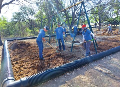 Volunteers tackle dozens of community projects during LCRA's "Steps Forward Day"