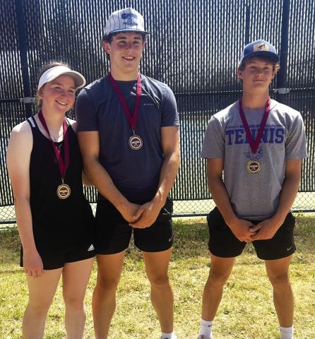 Congratulations to Layne Ward (right) on securing 1st place in boys singles and to Calun Kubin (left) and Eli Hutchins (center) on achieving 3rd place in mixed doubles at the Zephyr Tennis Tournament. Courtesy of Richland Springs Coyote Booster Club