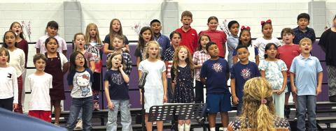 SSES 3rd grade class sings patriotic songs at last week’s Veterans Day Program. See Page 2 for story by Jessica Fuller.