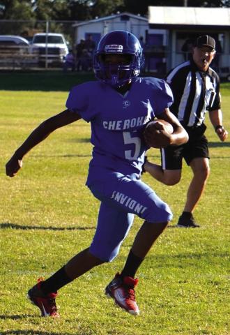 Adoniyah Ogens carrying the ball against Pawnee in the Cherokee JH football game last week. Courtesy of Valerie Valdez