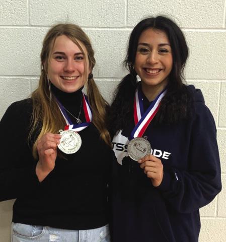 State Bound! Austyn Graham and Leslie Aguirre proudly pose for a picture with their runner up regional medals. Both ladies will be lifting at the state meet March 15, in Frisco Texas.