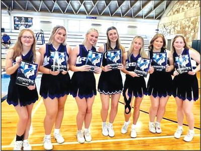 Richland Springs High School Cheerleaders (L-R): Dusti Gossett, Jadyn Fleming, Maggie Bryant, Mallory Okerson, Rylie Eckert, Bear Rigdon and Calyn Kubin. - Courtesy of Richland Springs Coyote Booster Club