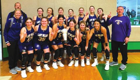 The San Saba High School girls varsity basketball team celebrates on Saturday, December 11th, following the Lady Dillos finishing in first place at the Santo High School Tournament. (Photo courtesy of the San Saba All-Sports Booster Club)