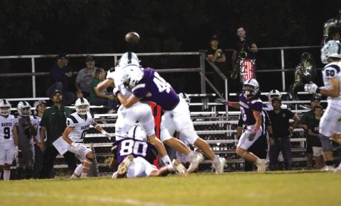 Adrian Martinez (80) and Jefferson Stencil (45) putting pressure on Harper’s quarterback. Courtesy of Kayti Lackey – 1916 athletics