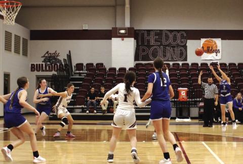 HS Emma Bryant (#2) going for 3 points in win against Zephyr