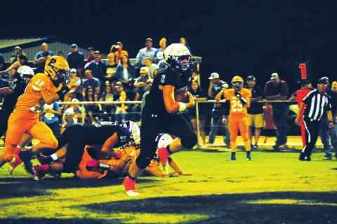 Shown is Richland Springs Coyote #2 - Keston Lusty running for a touchdown against Rochelle’s Hornets. See additional photos on Page 13. (Photo by Pam Starr)