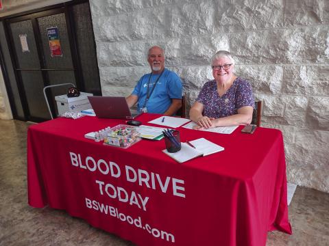 Maurice Weidler, BS&amp;W Donor Services Recruiter from Temple, Texas, on the left and San Saba County Emergency Management Coordinator Marsha Hardy on the right helped prospective donors get signed up.