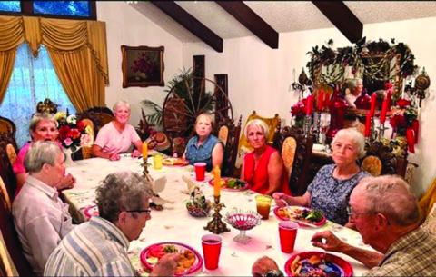 William Clark's 86th birthday celebration. Left to right: Jane Clark, Nancy (Clark) Hicks, Carrie (Clark) Keeney, Toni (Clark) Mayben, CheeChee (Clark) Brockman, Penny Clark, Patsy (Clark) Henniger, William Clark. Photo by Carrie Keeney