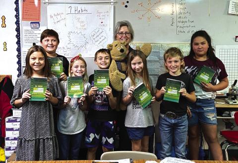 Sheila Meador with our third graders, Brylee Watson, Bentley Watson, Georgia Broyles, Knox Williams, Tayler Parker, Mason Palermo, and Addisyn Trinidad Photo courtesy of Shannon Padgett