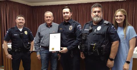 Proclamation recognizing May 11th - 17th as National Police Week. Mayor Ken Jordan read the proclamation he signed and presented it to these representatives of the San Saba Police Department. Pictured left to right: Officer Mann, Mayor Jordan, Officer Boivin, Officer Batchelor, and Admin Clerk Courtney Grady. Photo by Djuana Payton