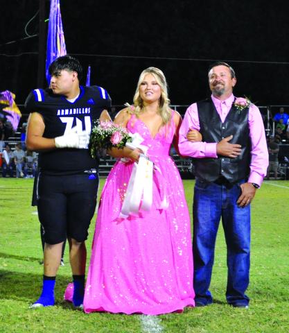Senior Caroline McHam is the daughter of Caleb and Tifani McHam. She is escorted by her father, Caleb. Flower Presenter is Aiden Martinez, son of Juan and Laura Martinez.