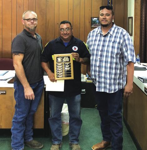 Ramiro Martinez, Sanitation Department employee, received the Employee of the Month award for September 2022. Pictured from left to right: Alderman Michael Nelson, Ramiro Martinez, and Juan Montoya, Supervisor of the Sanitation Department. Photo by Scott Glaze