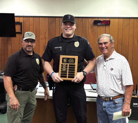 Lane Haviland, Police Officer San Saba Police Department, was selected as the Employee of the Month for March. Chief Stephen Lozano (left) and Alderman Robert Whitten (right) presented Lane with a plaque with his name on it and a gift certificate to a local restaurant at the March City Council meeting held on March 10, 2026.