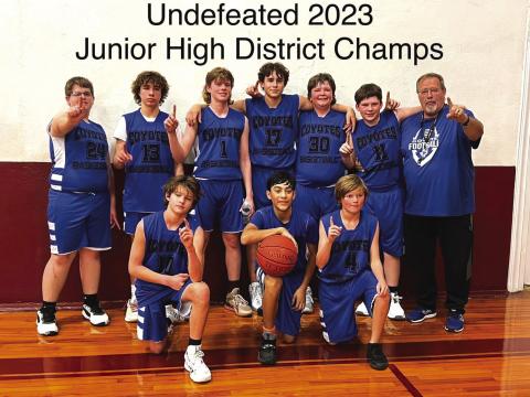 RS Junior High Boys - District Champs Back row, L to R: Hunter Womack, Cohen Ethridge, Sirr Beam, Eliyah Hutchins, Dalton Moats, Shane Harlow, and Coach Ethridge. Front row, L to R: Layne Wards, Ian McKinnerney, and Christian Greenwood
