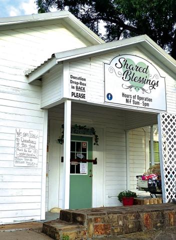 This photo was taken at Shared Blessings last Thursday, July 17th. The note to the left of the door says, “Full on donations at this time. Thank you for understanding. Photo by Djuana Payton